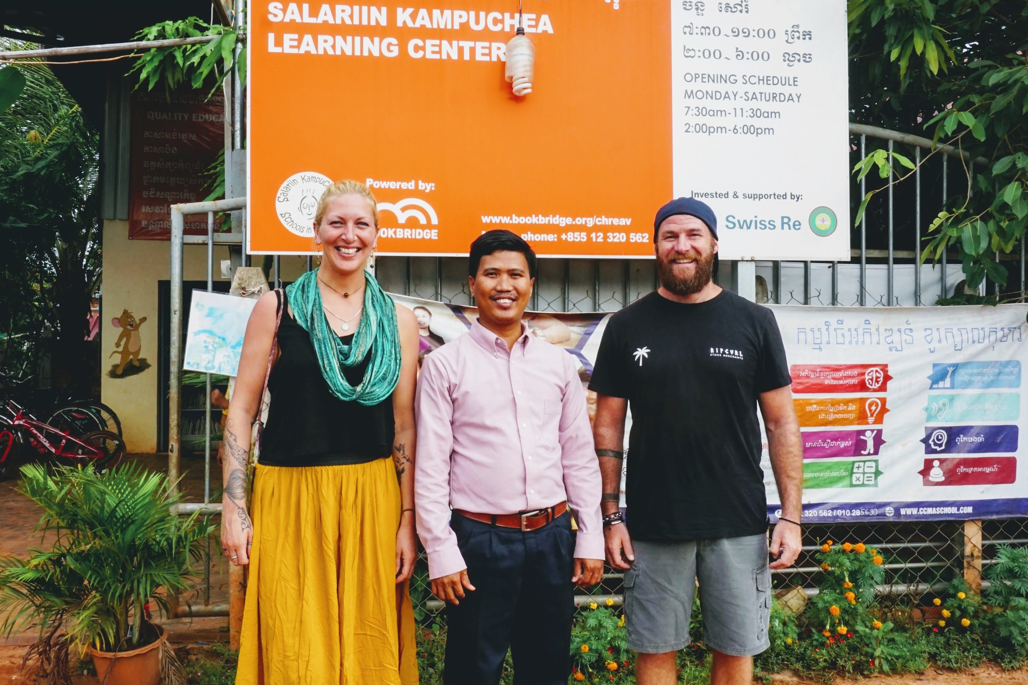 Cambodia in front of school showing how we give back to those in need with ethical jewellery